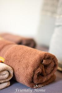 a brown teddy bear sitting on top of a table at Friendly Home - Gemütliches Backsteinhaus in Bornheim +36 photos