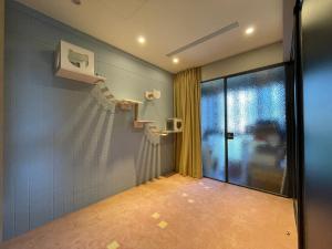 Voodi või voodid majutusasutuse Toucheng Joyful 宜蘭海景民宿-頭城小確幸 寵物友善 附充電車位 toas