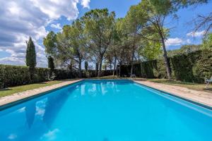 Bazén v ubytování Lodging Apartments Villa el Raco nebo v jeho okolí