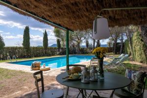 Bazén v ubytování Lodging Apartments Villa el Raco nebo v jeho okolí