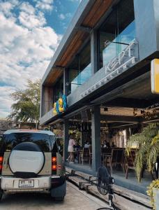 a car parked in front of a building at KEPT Cabana เคปท์ คาบานา in Lampang