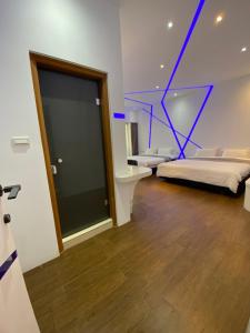 Postel nebo postele na pokoji v ubytování Beauty House Homestay