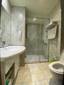 Koupelna v ubytování Beauty House Homestay + 29 fotografií