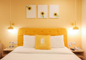 Postel nebo postele na pokoji v ubytování Bloom Hotel - Jalandhar + 21 fotografií