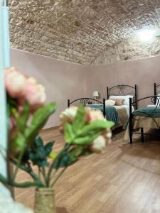 Postel nebo postele na pokoji v ubytování Gasparro House