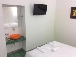 Postel nebo postele na pokoji v ubytování Zana Hotel Boutique