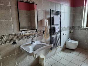 Koupelna v ubytování AGRITURISMO I CAMINI + 2 fotografie