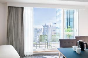 a hotel room with a view of a city at Tokyu Stay Shibuya Shin-Minamiguchi in Tokyo