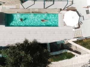 Bazén v ubytovaní Aristi Mountain Resort alebo v jeho blízkosti