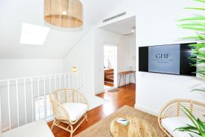 TV a/nebo společenská místnost v ubytování Tropical Flavour Apartment