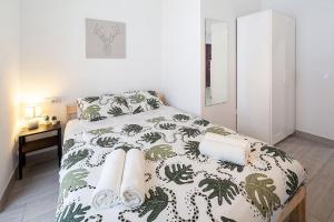 A bed or beds in a room at Gran piso en el centro histórico