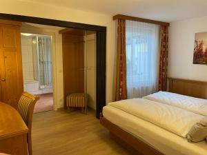 Ein Bett oder Betten in einem Zimmer der Unterkunft Altstadt Hotel Glockenhof