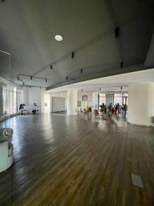 an empty room with a wooden floor in a building at A Scenic Escape within Nairobi in Nairobi