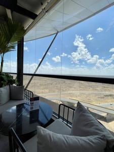 a room with a view of the desert from an airport at A Scenic Escape within Nairobi in Nairobi
