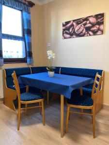 Posedenie v ubytovaní Vamos Apartman