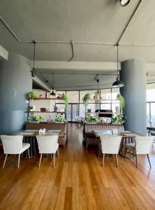 a restaurant with tables and chairs in a room at A Scenic Escape within Nairobi in Nairobi +37 photos