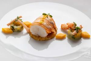 a plate of food with shrimp and vegetables on it at Hotel Le Negresco in Nice