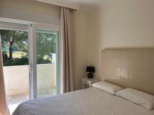 Postel nebo postele na pokoji v ubytování Balcón de la Cala