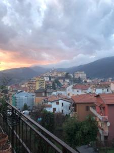 a view of a city with buildings and a sunset at La Casa nella Pineta in Fiuggi