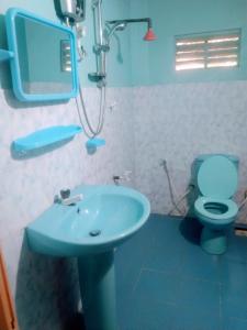 Bilik mandi di Sigiriya Guest House Inamaluwa