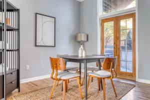 a dining room with a table and chairs at Dupont 2BR w Patio WD nr nightlife WDC-340 in Washington, D.C.