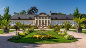 a large building with a garden in front of it at Green Cellar studio Centre de Strasbourg - 5 min conseil de l'Europe in Strasbourg