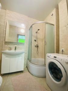 Ванна кімната в Апартаменты в ЖК Комфорт Таун