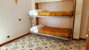 Postel nebo postele na pokoji v ubytování Hotel Bristol
