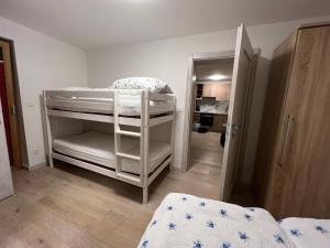 Postel nebo postele na pokoji v ubytování Loferlodge Top 3
