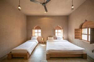 Letto o letti in una camera di Alaqur View Inn نزل واجهة العقر