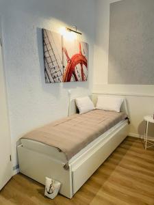 Ein Bett oder Betten in einem Zimmer der Unterkunft Altstadt Hotel Glockenhof