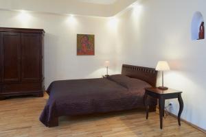 Giường trong phòng chung tại Regina House- sv. Mikalojaus 13