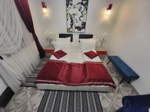 Un pat sau paturi într-o cameră la Amaraz Center