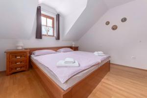 Voodi või voodid majutusasutuse Apartma Metka toas