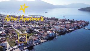 an aerial view of a small island in the water at Asteri Apartments Mytikas 2-Bedroom Seaview Courtyard in Mitika