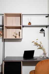 an office with a desk with a laptop on it at Bob W Sentralen in Oslo