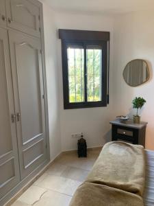 Posteľ alebo postele v izbe v ubytovaní Casa Pia Frigiliana