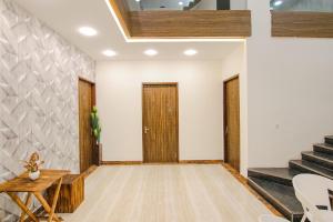 Fotografie z fotogalerie ubytování FabHotel Sky Lark Farm v destinaci Ludhijána