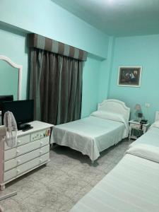 Postel nebo postele na pokoji v ubytování Hotel Tanausu