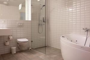 Uma casa de banho em Hotel Selfoss