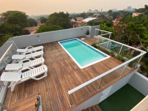 Bazén v ubytování Apart-Hotel de Lujo en Eje Corporativo de Asunción! 2 y 3 habitaciones nebo v jeho okolí