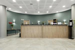 Lobby alebo recepcia v ubytovaní All Suites Noisy Le Grand