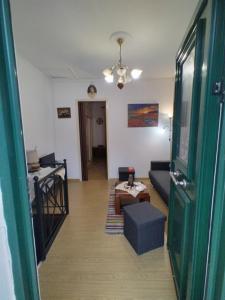 Postel nebo postele na pokoji v ubytování Vaggelitsa's House