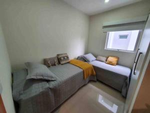Postel nebo postele na pokoji v ubytování Apart-Hotel de Lujo en Eje Corporativo de Asunción! 2 y 3 habitaciones