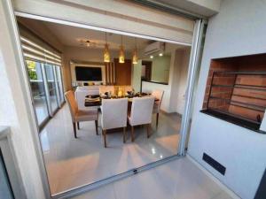 TV a/nebo společenská místnost v ubytování Apart-Hotel de Lujo en Eje Corporativo de Asunción! 2 y 3 habitaciones