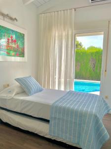 A bed or beds in a room at Casa Mar