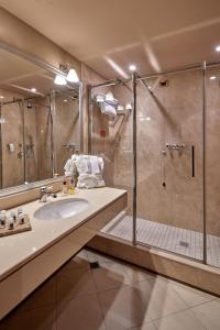 a bathroom with a sink and a shower at Hotel Accademia in Verona