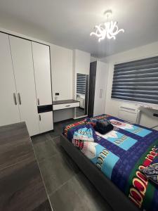 Un pat sau paturi într-o cameră la Dolce Italia Residence