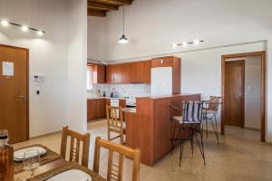 A kitchen or kitchenette at Villa Cleronomia, private pool, seaview,