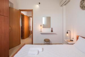 A bed or beds in a room at Villa Cleronomia, private pool, seaview,
